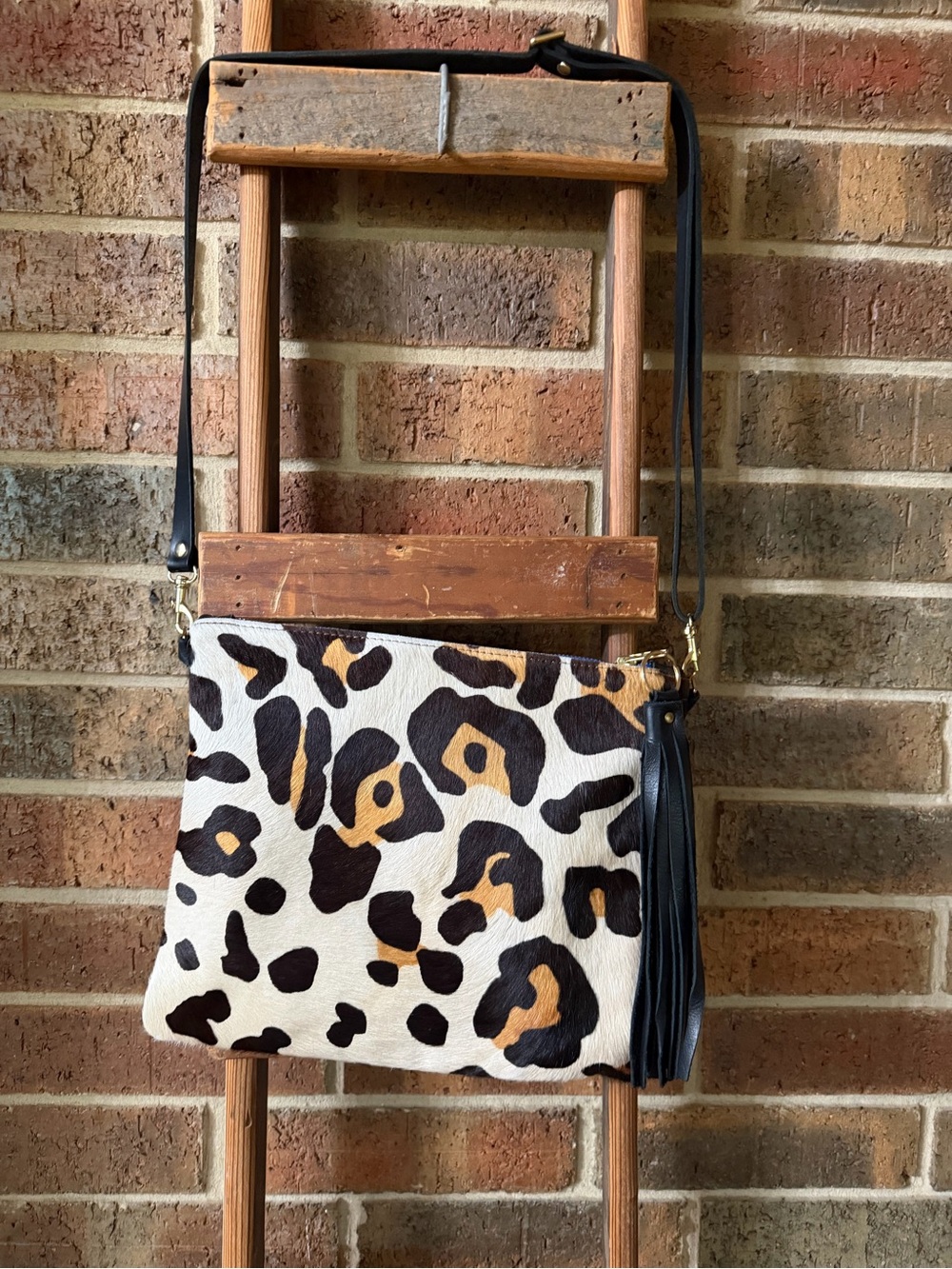 Leopard Print Crossbody Bag with Black Strap and Tassel
